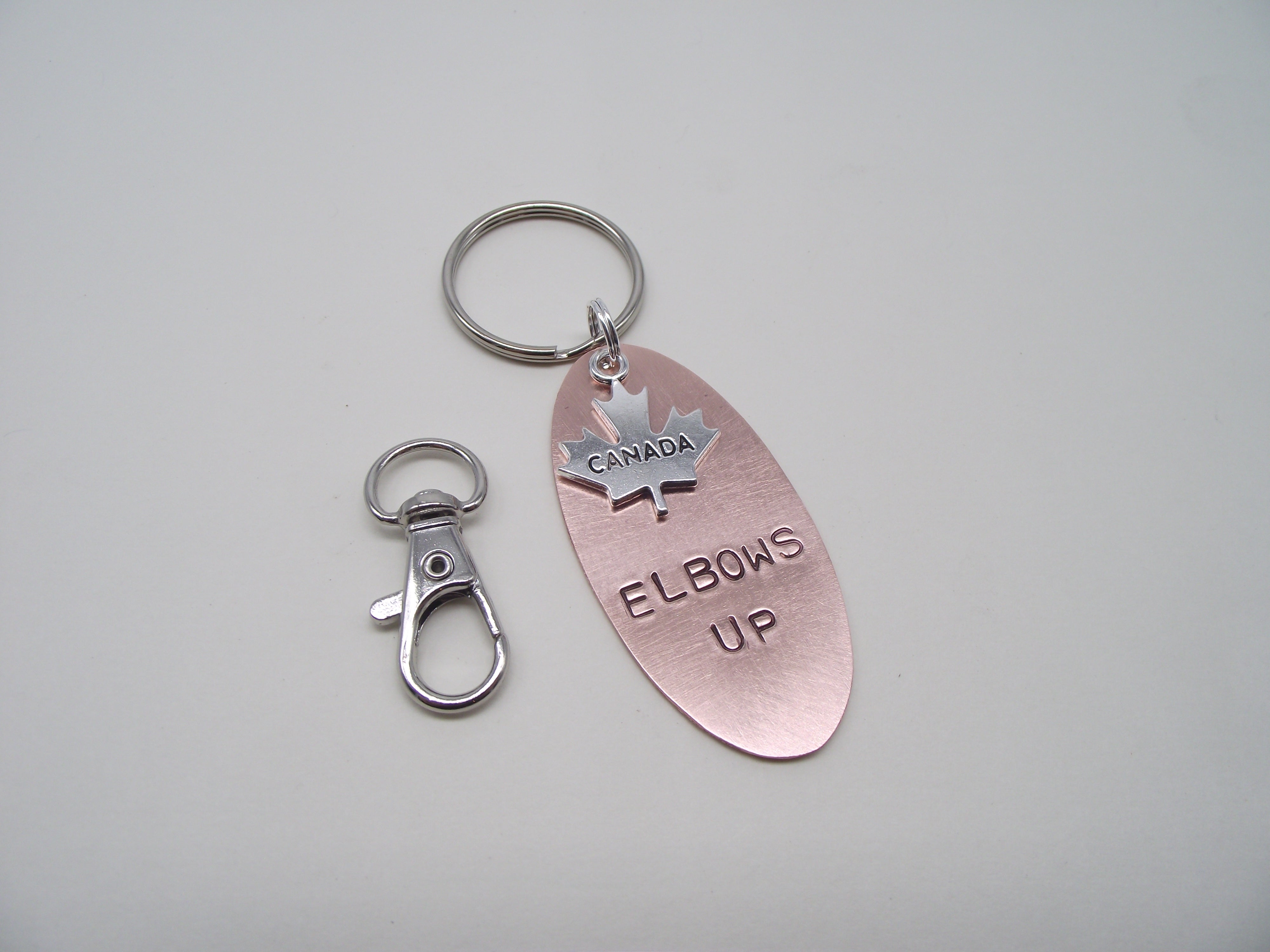 Copper Elbows Up Key Ring -Oval